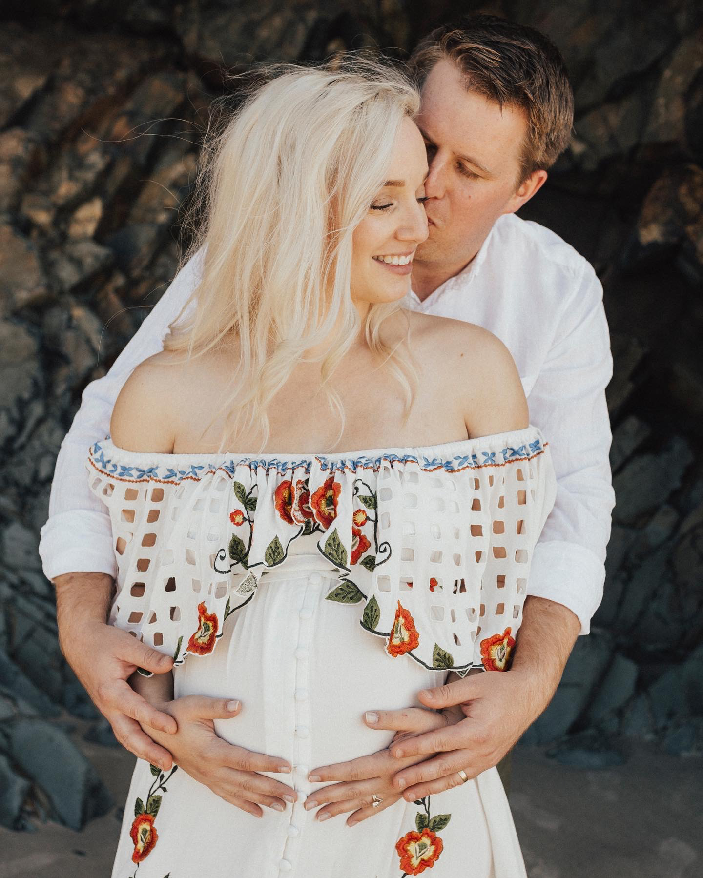 Maternity image of a couple at Hug Point beach photography