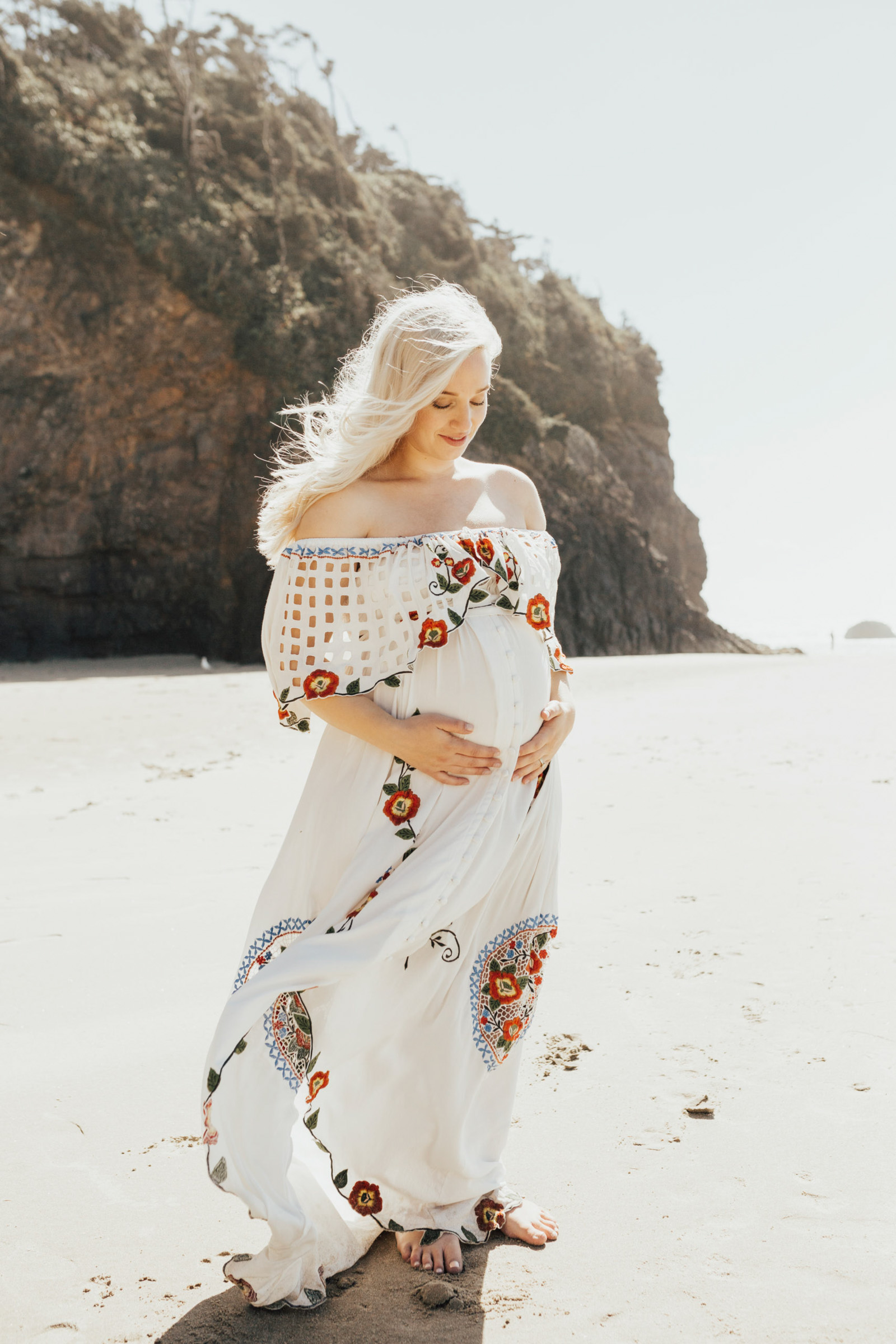 Maternity image of woman at Hug Point beach photography