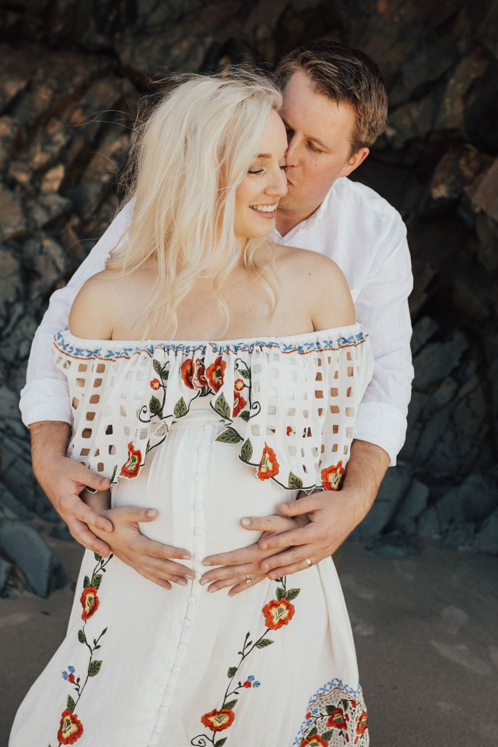 Maternity image of a couple at Hug Point beach photography