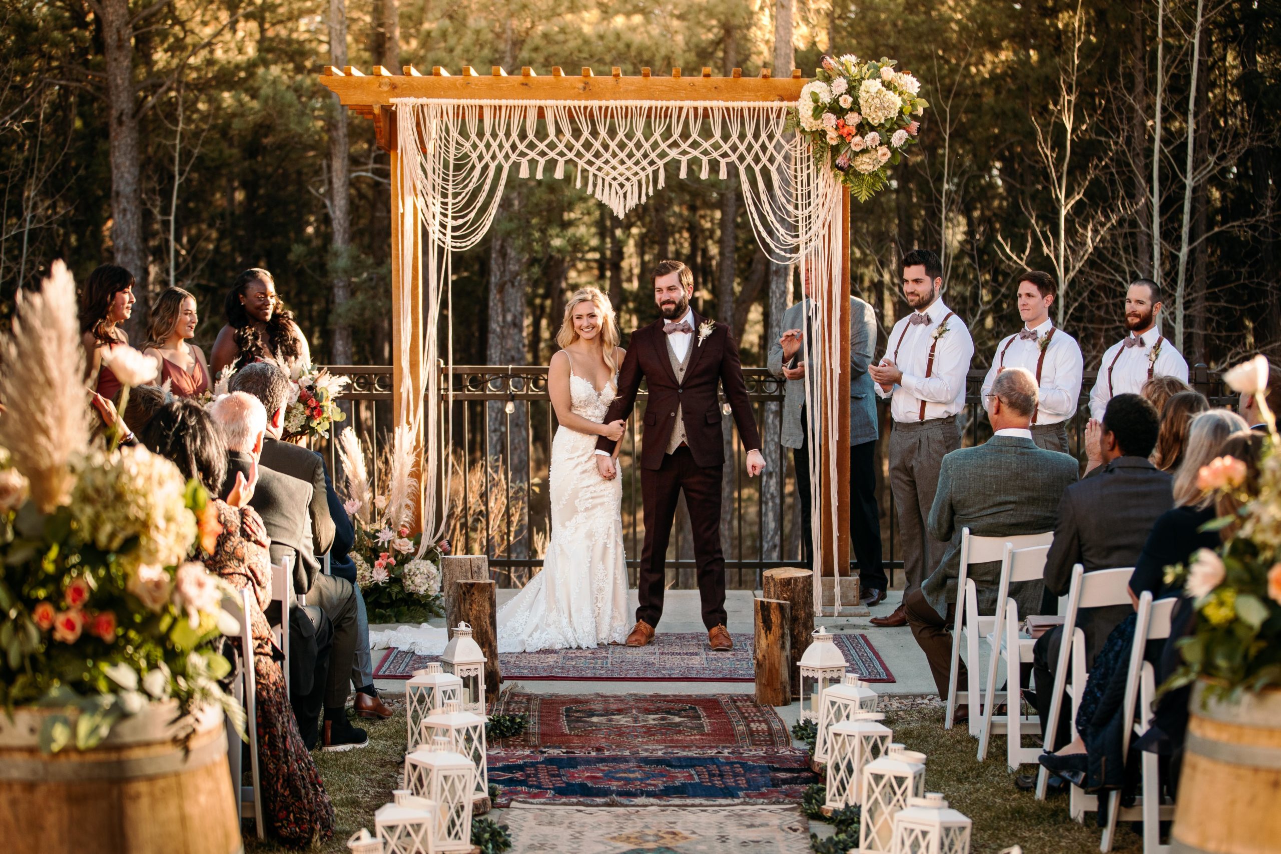 Wedding photography of a beautiful outdoor ceremony at Black Forest by Wedgewood in Colorado Springs.