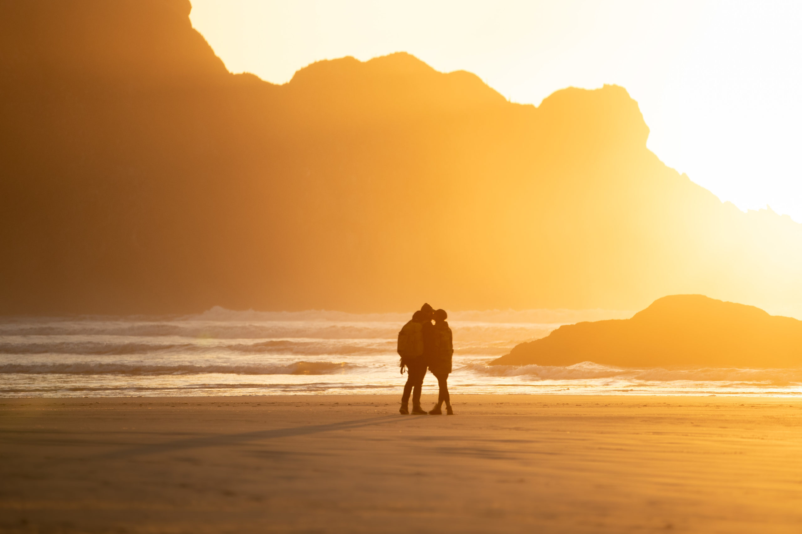 Photography of a couple on the Oregon Coast during sunset