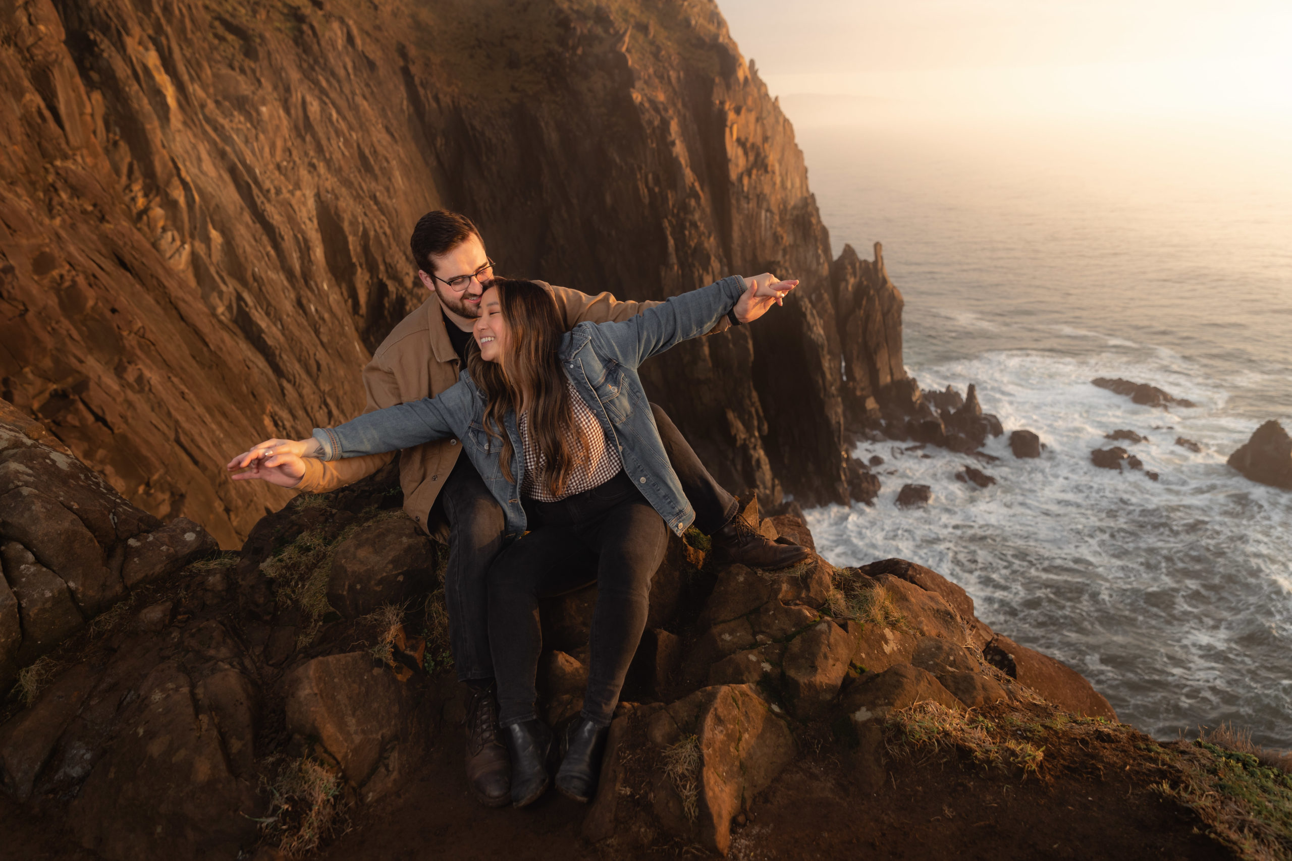 Engagement photography shot at Manzanita Cliffs on the Oregon Coast